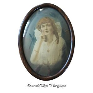 Vintage bubble glass convex picture with posed woman.